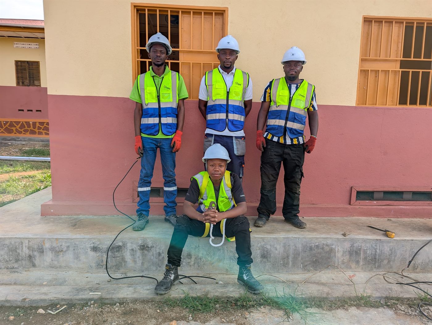 GEERS team in front of a building equipped and delivered